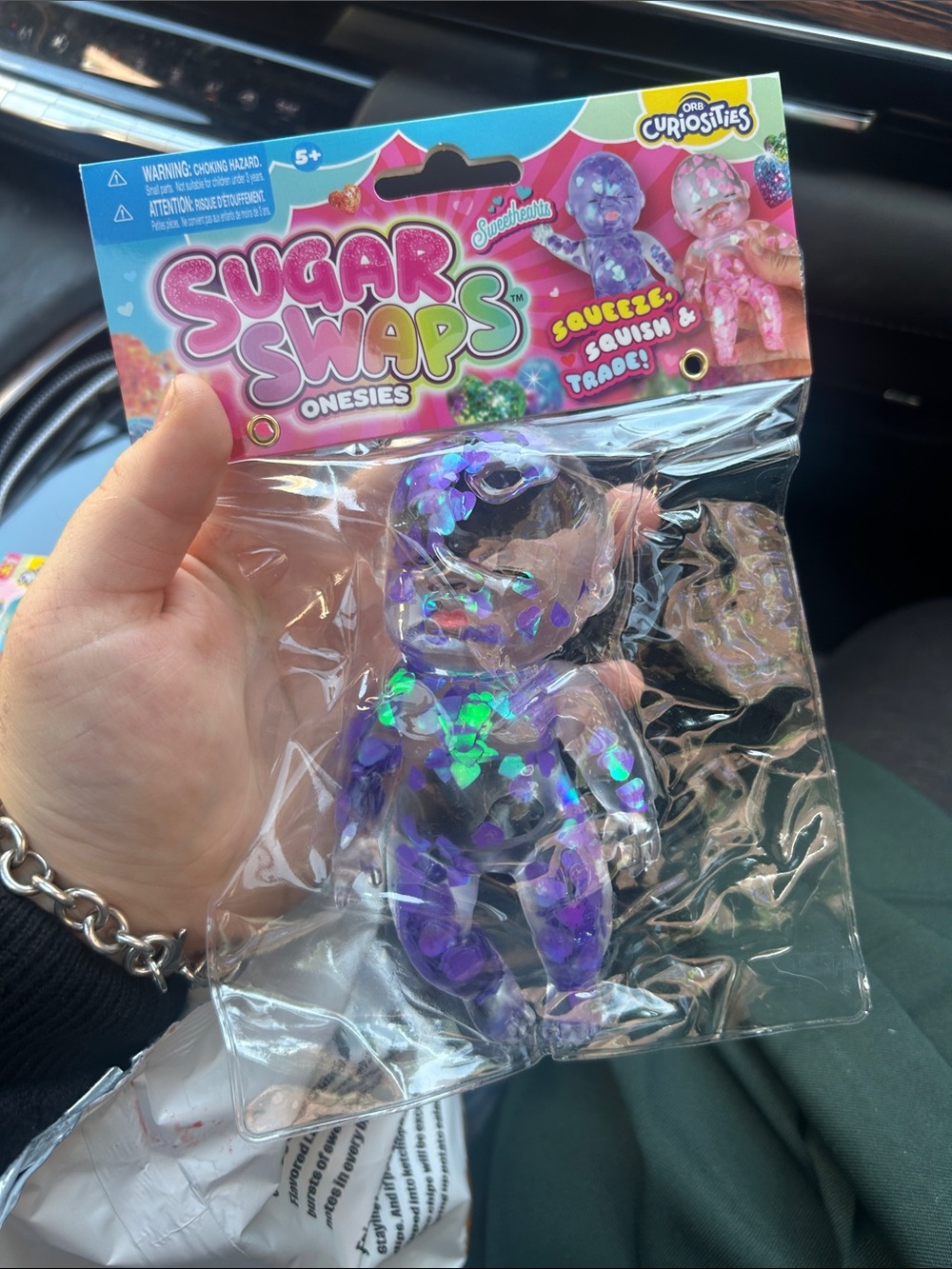 Sugar Swaps Onesies Purple Holographic Squeeze Toy